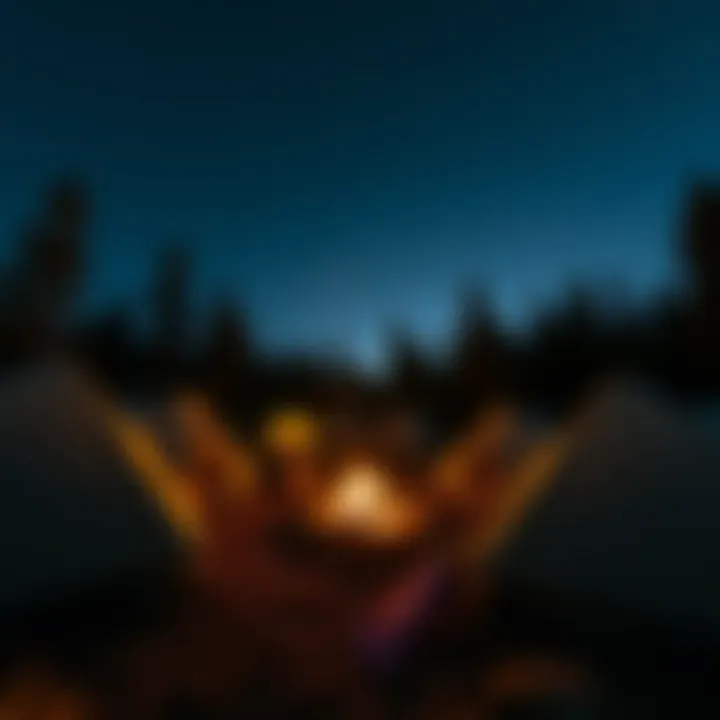 Campfire surrounded by tents under a starry sky