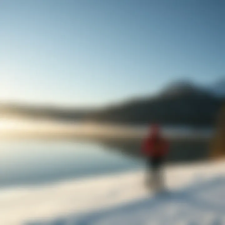 Skier gliding past a tranquil frozen lake