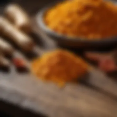 Golden turmeric roots and powder on a wooden table