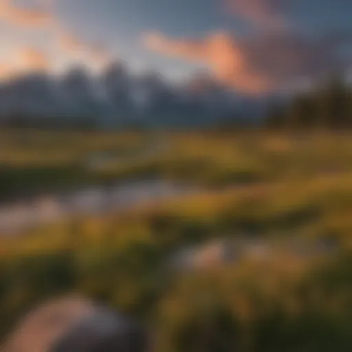 A panoramic view of the Teton Mountain Range during sunset