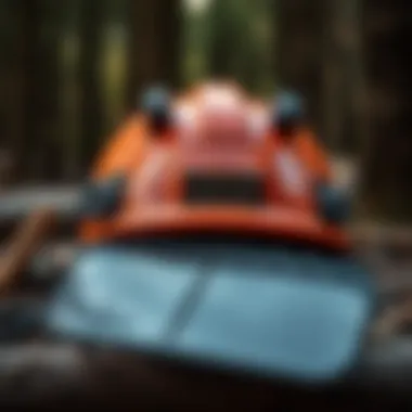 Safety helmet fitted with visors and ear protection, essential for chainsaw operators.