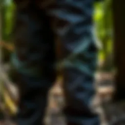 Close-up of protective chainsaw pants showcasing reinforced fabric for durability.